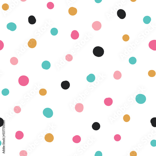 Cute hand drawn seamless pattern with Colorful Polka Dots. Abstract Multicolored doodle shapes on white background. Design for background, wallpaper, wrapping, fabric, and all your creative project.