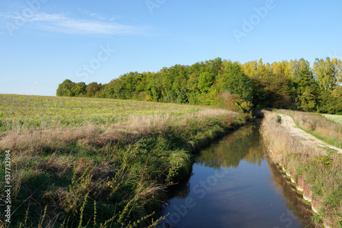 Towpath along the Thérouanne canal. Congis-sur-Thérouanne village in Île de France region