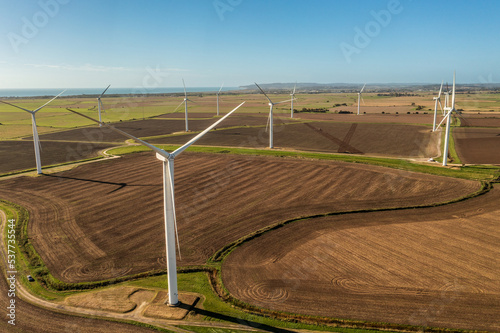 Wind farm photos, showing farm land and electricity generation