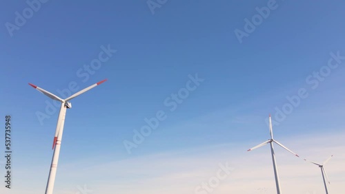 Wind turbines. Wind generator. Renewable energy sources. Environmental protection. Respect for the environment. Innovation. Electricity generation. Friendly industry to environment. Wind farm.