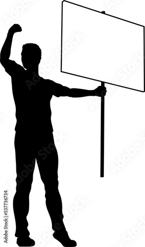 Protestor or demonstrator at a demonstration march, picket line or strike protest rally in silhouette. Holding up a banner or picket sign board placard.