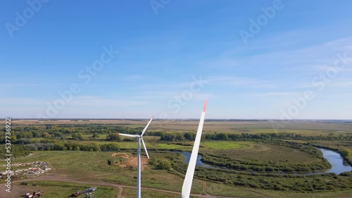 Wind turbines. Wind generator. Renewable energy sources. Environmental protection. Respect for the environment. Innovation. Electricity generation. Friendly industry to environment. Wind farm.