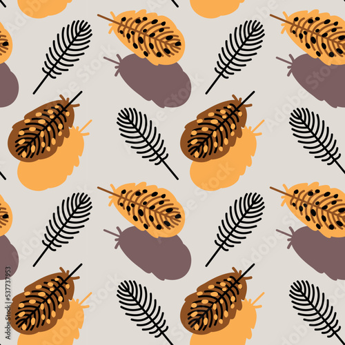 Seamless colored pattern with spotted bird feathers. Stylization of elements of animal origin. Flying feathers and fluff on a gray background. Flat cartoon graphics.