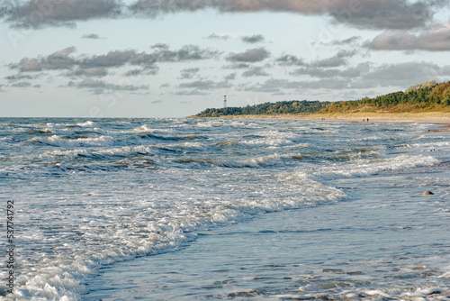 Beautiful stony beach and sandy dunes with pine trees, coastline on the Baltic Sea in Lithuania's Seaside Regional Park photo