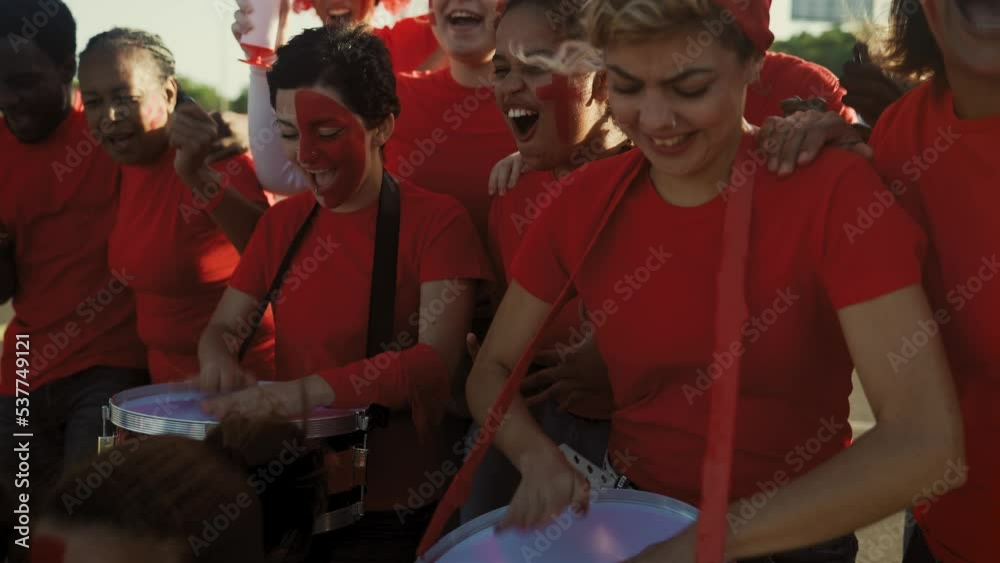 Football fans having fun supporting their favorite team - Soccer sport entertainment concept Football fans having fun supporting their favorite team - Soccer sport entertainment concept