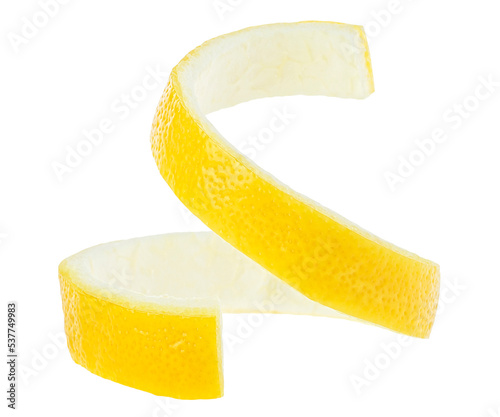 Lemon peel in the form of a spiral isolated on a white background. Lemon twist.