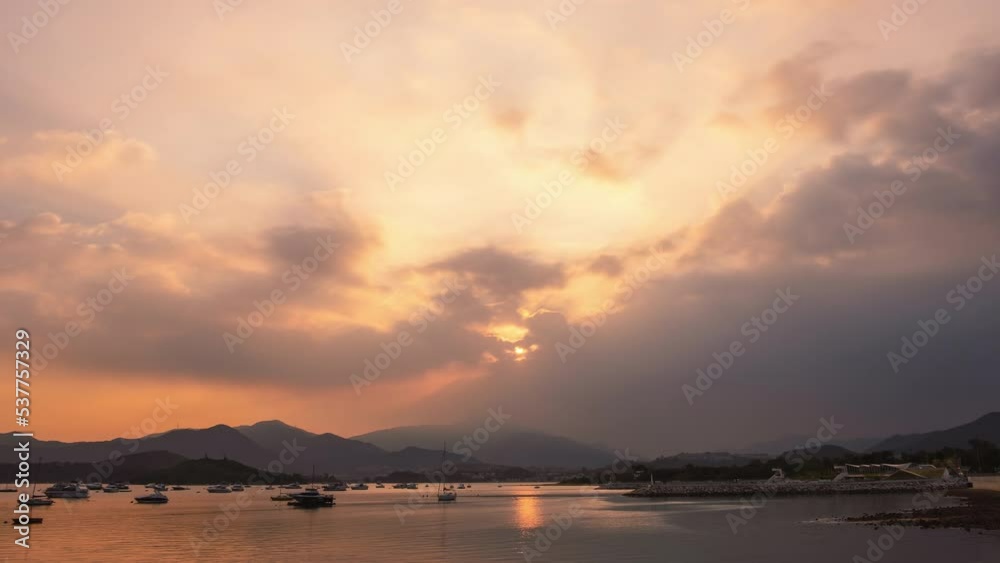 Time lapse of sailing boat silhouette sunset with colorful sky dramatic cloud. Time lapse of sailing boat silhouette sunset with colorful sky dramatic cloud.
