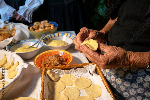 preparation of Sardinian culurgiones. Typical fresh pasta filled with potatoes and mint photo
