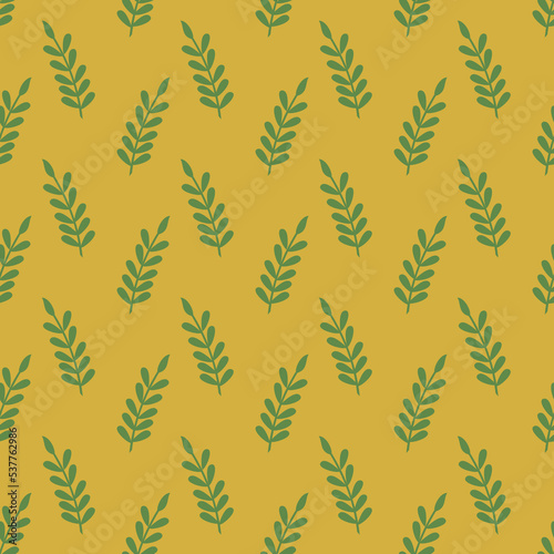 Green leaf seamless vector pattern isolated on yellow backdrop.Design for use backdrop all over textile fabric print wrapping paper and others.