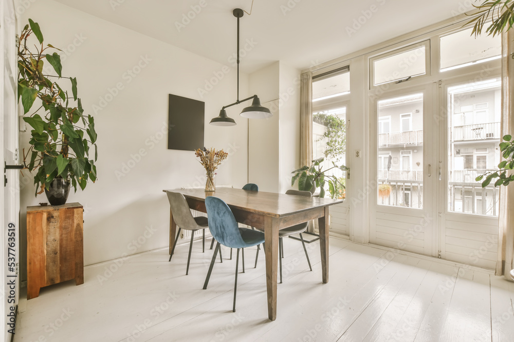 Dining table near glass doors Dining table near glass doors