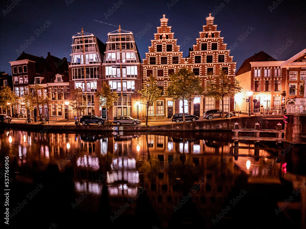 Haarlem at night, along the Donkere Spaarne river in the Netherlands
