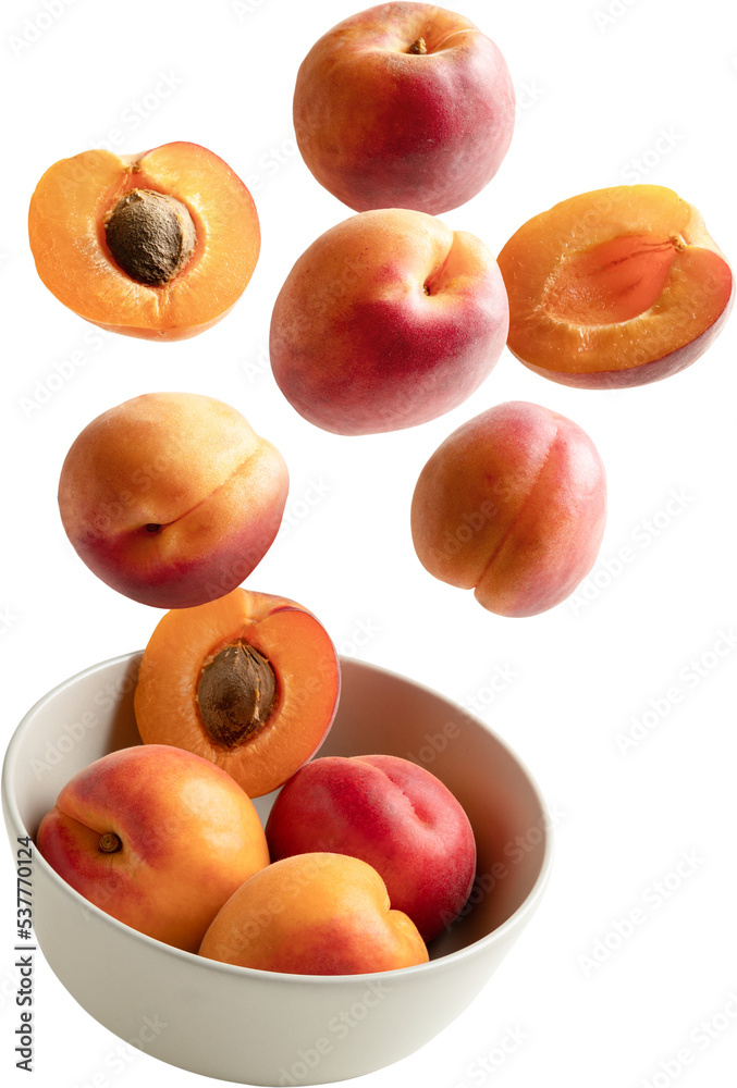Peaches falling into a bowl Peaches falling into a bowl
