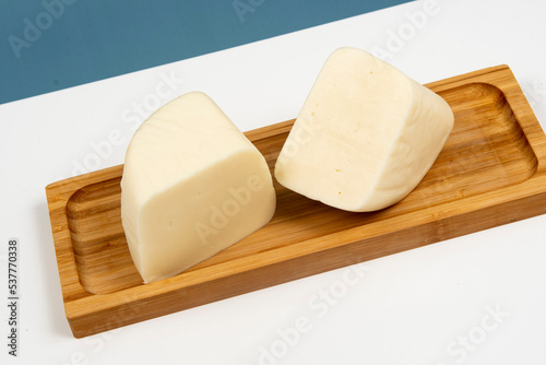 Minas half-cured cheese on a bamboo tray,