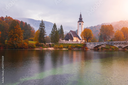 Famous lake Bohinj on a foggy morning in the Julian Alps in Triglav National Park near Lake Bled
