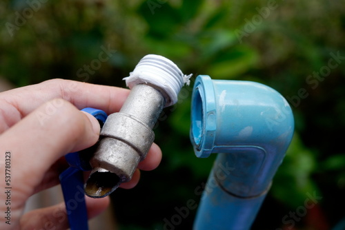 The tap is broken and cannot be used to turn on the water.