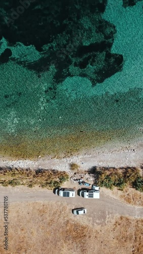 Blue sea and caravan camp