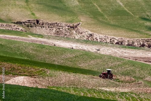 Fields and mountains in the north of Afghanistan near Faizabad city photo