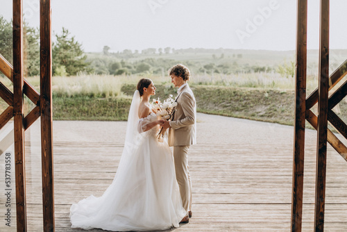 фотографія Young wedding couple on their wedding
