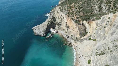 Aerial view of the Atlantic ocean and coastal cliffs in Arrabida Natural Park, Portugal photo