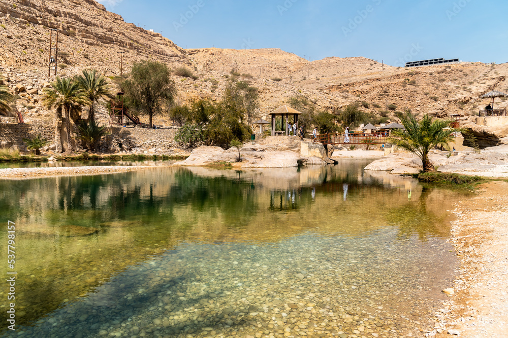 View of the Wadi Bani Khalid oasis in the desert in Sultanate of Oman. View of the Wadi Bani Khalid oasis in the desert in Sultanate of Oman.