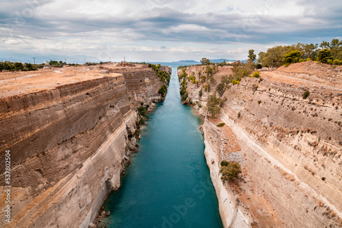 Corinth canal in Greece that connects the Gulf of Corinth in the Ionian Sea with the Saronic Gulf in the Aegean Sea photo