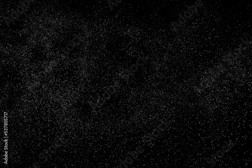 Distressed white grainy texture. Dust overlay textured. Grain noise particles. Rusted black background. Vector illustration. EPS 10. 
