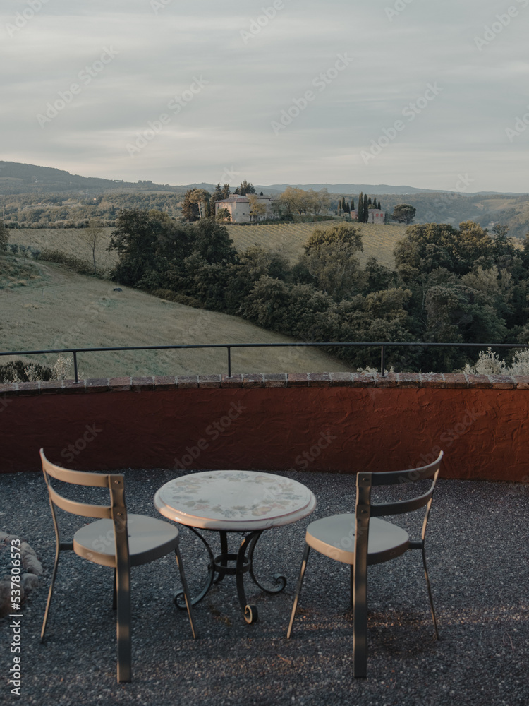 Little terrace with a view of the tuscan landscape around Siena, Italy
