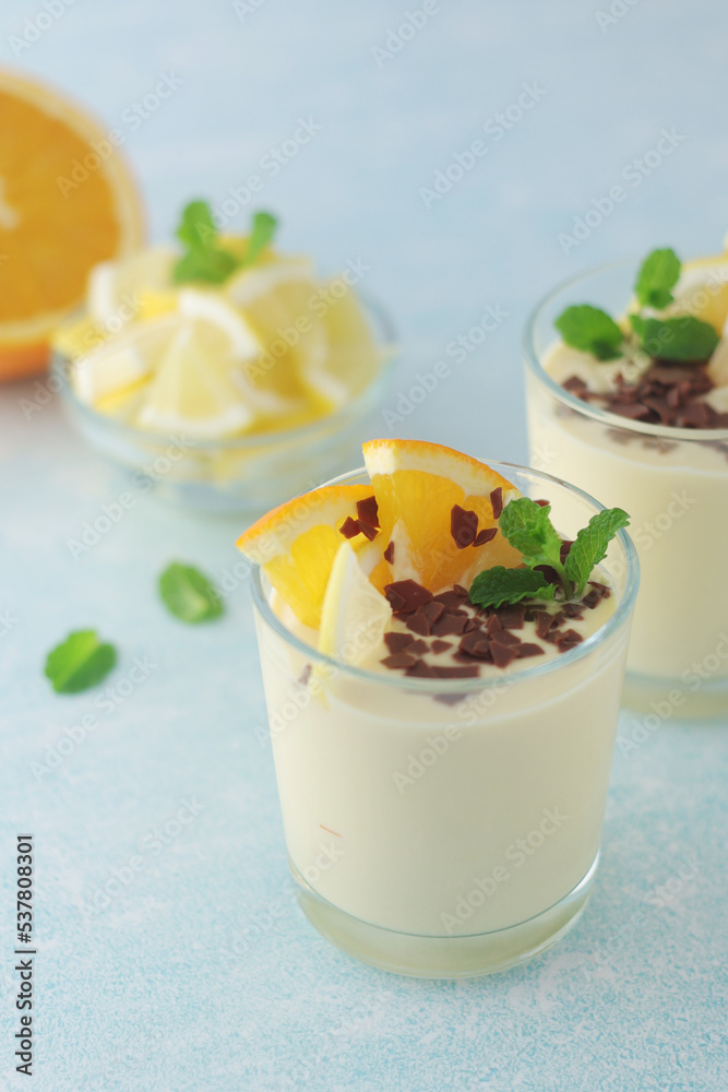 Orange lemon citrus milk mousse in glasses Orange lemon citrus milk mousse in glasses