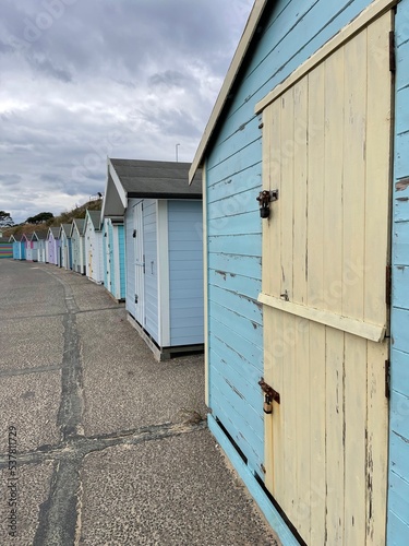 Beach huts on the seafront painted bright colours. Taken in Lowestoft England.  © ReayWorld