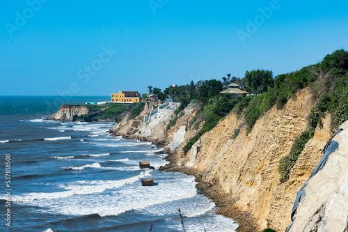 Barranquilla, Atlantico, Colombia. July 30, 2022: The Castle of San Antonio de Salgar by the sea and blue sky. photo