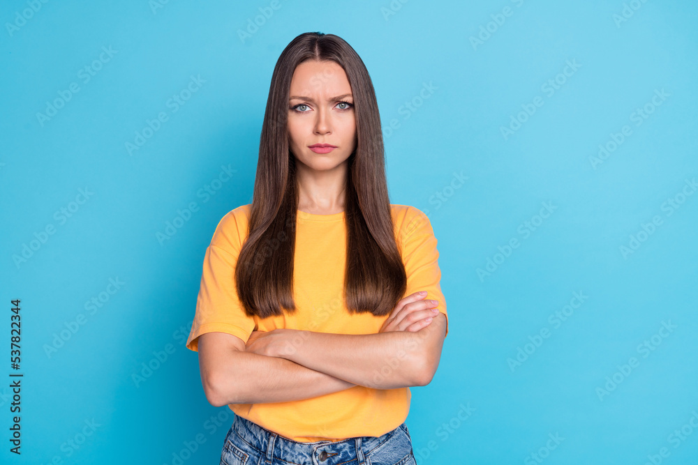 Photo of unsatisfied lady orange outfit bad mood negative reaction stand empty space clothes isolated on blue color background Photo of unsatisfied lady orange outfit bad mood negative reaction stand empty space clothes isolated on blue color background