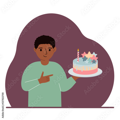 A little boy celebrates a birthday or some event. A little boy with a birthday cake with a candle.