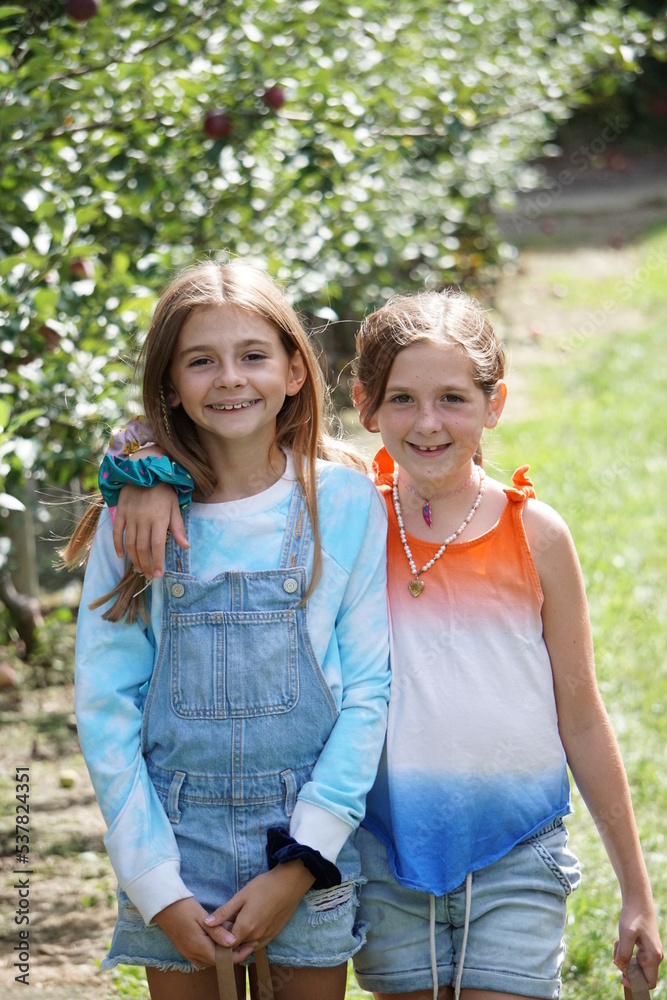 Fototapeta premium Two girls smiling