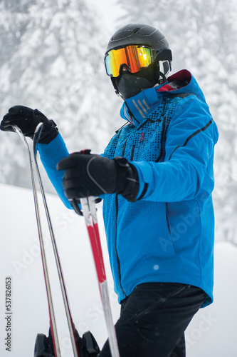 Skier in the winter in the mountains