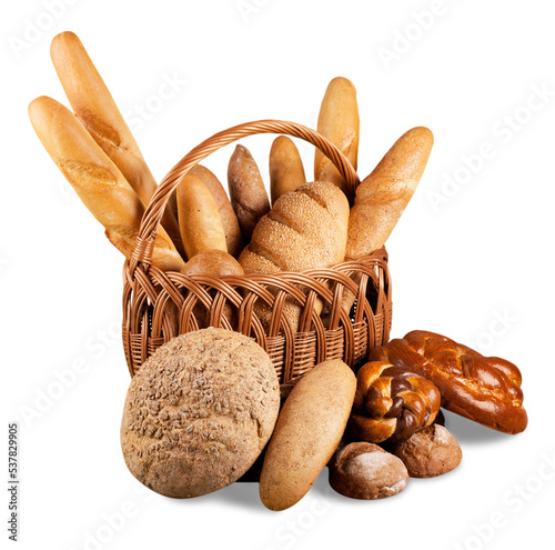 Composition with bread  in wicker basket isolated on white