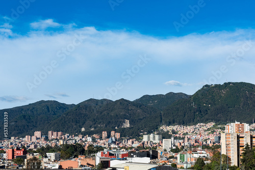 Bogotá, Colombia. May 23, 2022: Panoramic and urban landscape of the city with blue sky.