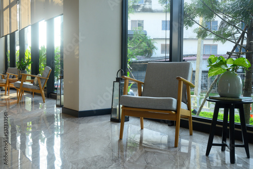 Interior of a modern hotel lounge cafe bar restaurant with beautiful sunlight.