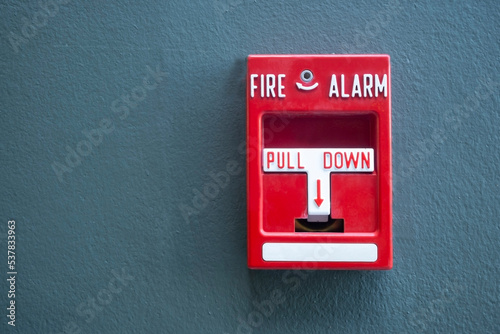red fire alarm on the wall