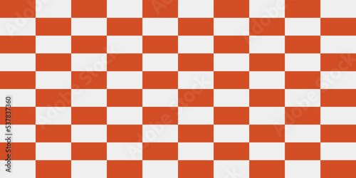 A checkerboard pattern of orange tiles alternating with white ones. Vector from orange rectangles.