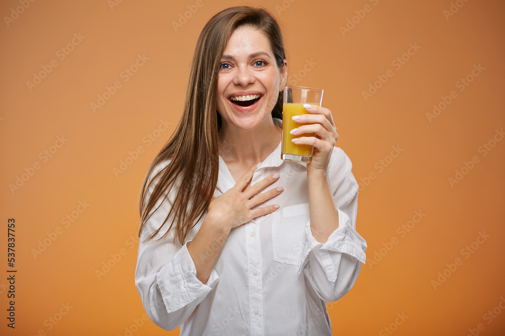 Woman holding orange juice. Isolated female advertising portrait. Woman holding orange juice. Isolated female advertising portrait.