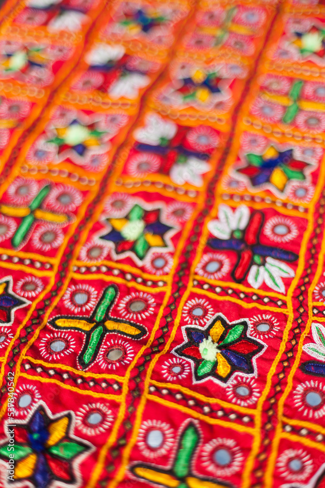 Details of embroidered traditional dress, ornemented with mirrors, Meghwal tribal style, Kutch region, Gujarat, India