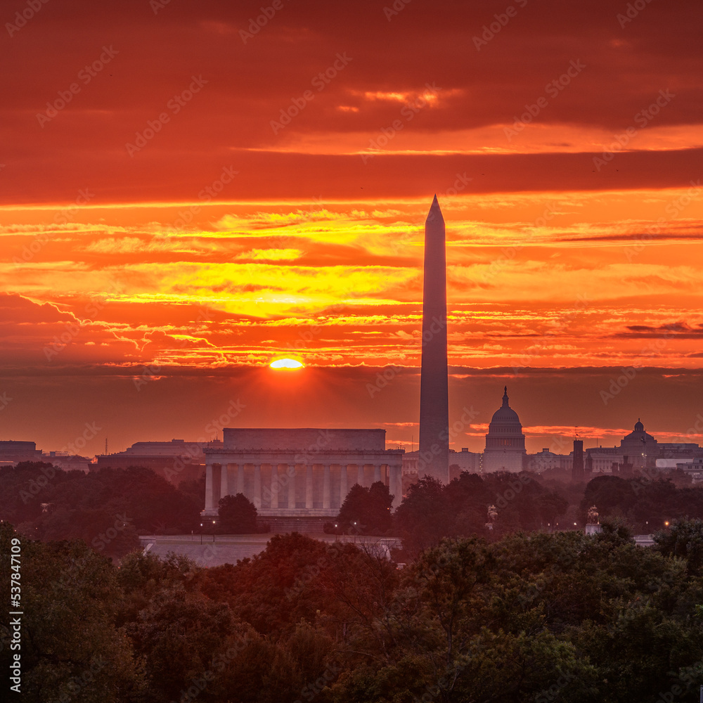 Sun Rising Above a Band of Clouds Beyond Washington, DC