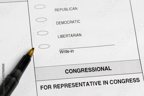 Election ballot with write-in vote. Political party, government and voting concept photo