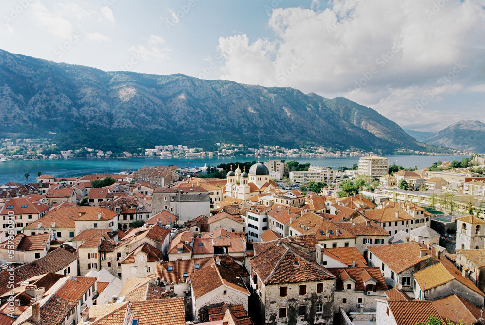 Red tiled roofs of ancient houses in the port of Kotor. Montenegro