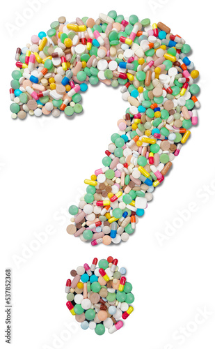 Colorful pills in question sign form isolated on white