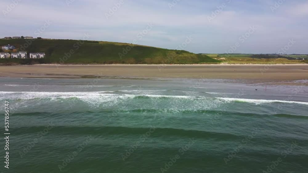 Sea waves and a beach on the coast of Ireland. Seaside landscape. Sea waves and a beach on the coast of Ireland. Seaside landscape.