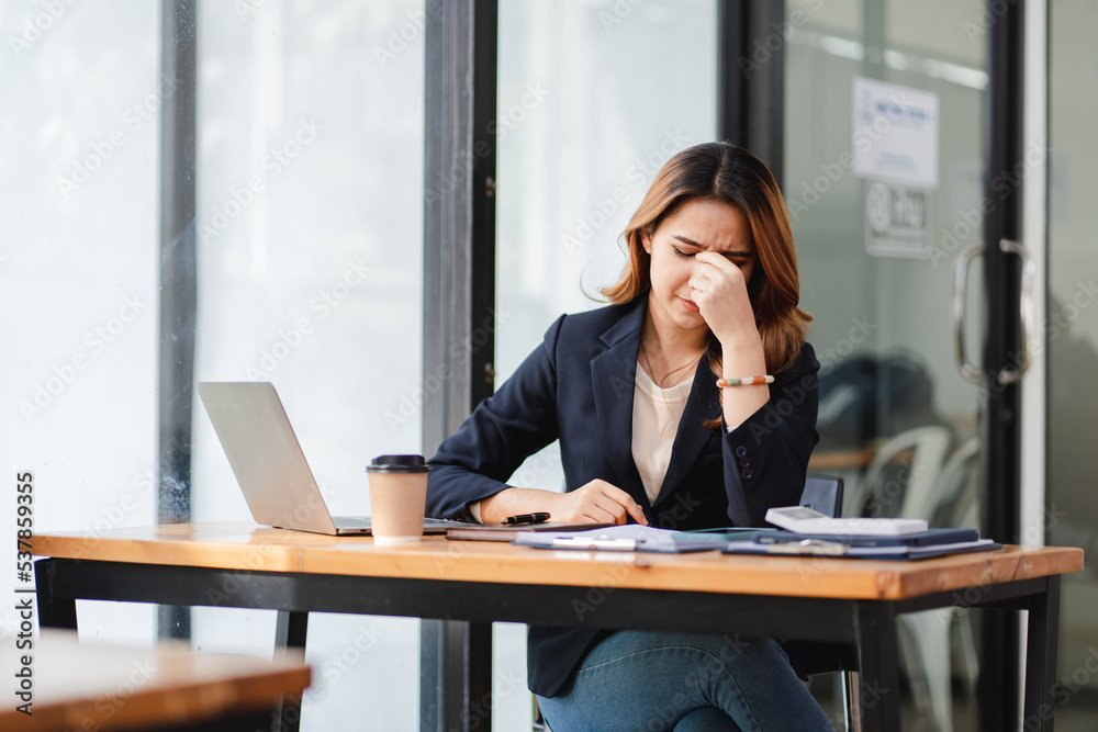 stressed asian woman The project failed, worried, hopeless, confused, exhausted. stressed asian woman The project failed, worried, hopeless, confused, exhausted.