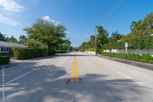 empty road with yellow marking on avenue way photo