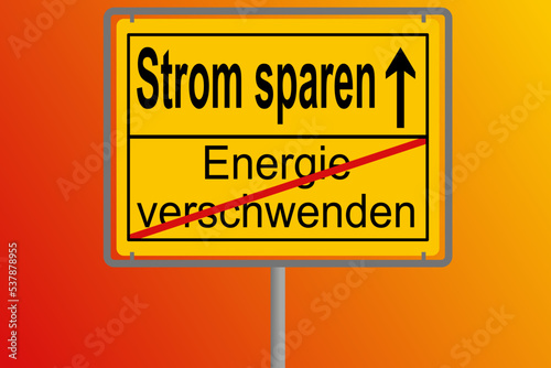 Schild Richtung Strom sparen