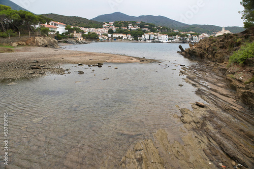 Seascape the village of Cadaqu  s  near Barcelona. Picturesque old town with a beautiful beach. Isolated fishing village in the mountains. Famous tourist destination on the Costa Brava with the landmar
